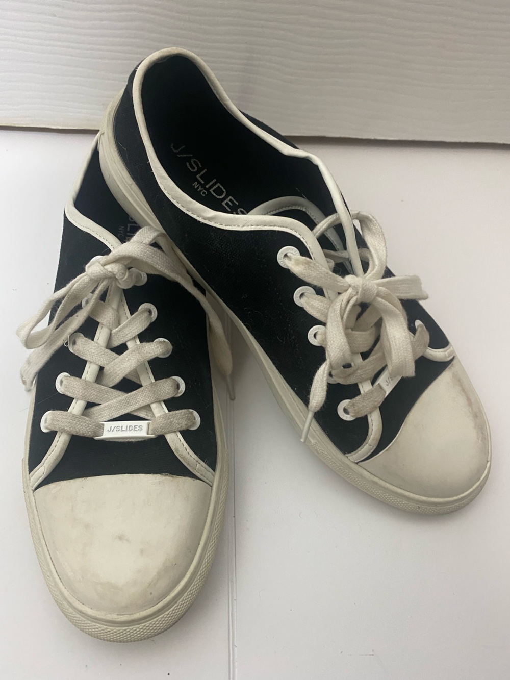J/SLIDES Women’s Black and White Canvas Low-Top Sneakers